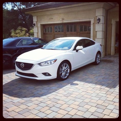 My first brand new car! Mazda6 iTouring with tech package in snowflake white pearl. She's beautiful. I hope she stays with me for a long time. P.c. Some blog. White Mazda 6 Sedan, White Mazda, Mazda 6 Sedan, Mazda 3 Sedan, Brand New Car, Mazda Cars, White Car, Mazda 6, Mazda 3