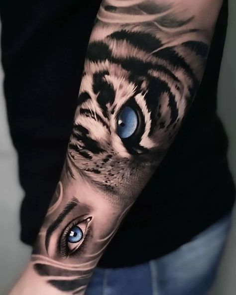 Tiger Tattoo With Blue Eyes And Flowers, Tiger And Human Eye Tattoo, Half Eye Half Tiger Tattoo, Tiger Eyes Tattoo For Women Sleeve, Tiger With Blue Eyes Tattoo, 3rd Eye Tattoo, Tiger Tattoo Meaning, White Tiger Tattoo, Tiger Face Tattoo