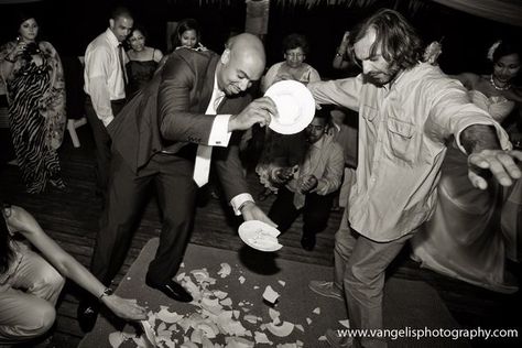 The Greek Zeimpekiko of George and dishes!!!  photography by www.vangelisphotography.com   Weddings & Events in Santorini by Poema Event Specialists Smash Plates, Plate Smashing, Greek Wedding Theme, Smashing Plates, Greek Wedding Traditions, Greek Traditional Dress, Greek Dancing, Dana Villas, Bar Wedding Reception