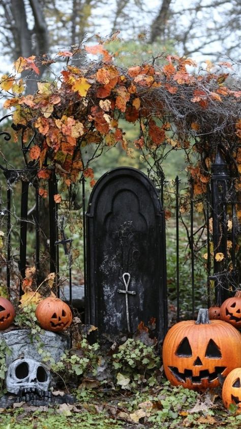 Craft a Halloween graveyard that's equal parts spooky and stylish! Use a monochromatic color scheme with shades of gray, black, and white for a sophisticated look. Create elegant tombstones with ornate designs, add Victorian-inspired lanterns, and incorporate vintage-looking photos of ghostly figures. Don't forget to add some eerie music to complete the ambiance. Your Halloween graveyard will be a hauntingly beautiful addition to your outdoor decor. Halloween Lanterns Outdoor, Spooky Cemetery Graveyards, Victorian Halloween Decorations Outdoor, Haunted Cemetery Halloween, New Orleans Graveyard, Spooky Garden Halloween, Gothic Yard, Graveyard Halloween Yard, Halloween Hallway