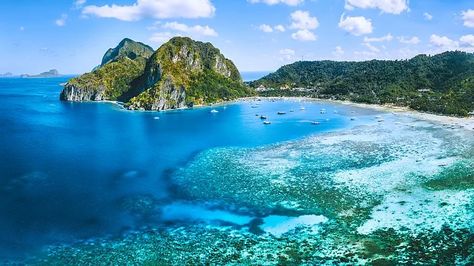 Aerial view of a beach with extensive reefs surrounded by hills covered with greenery Puerto Princesa Subterranean River, Beach Philippines, Philippines Island, Tropical Islands Paradise, Puerto Princesa, Palawan Philippines, Hidden Beach, Natural Park, Panoramic View