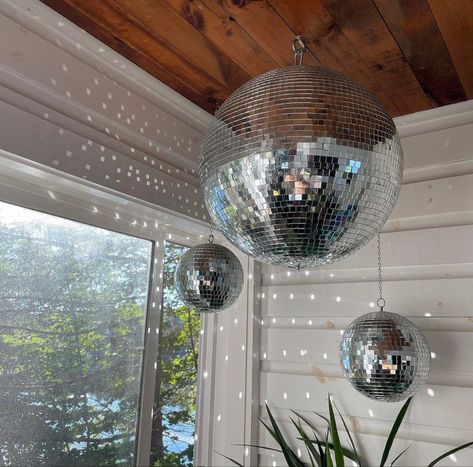 Disco ball unique room ideas Mirror Ball Living Room, Disco Ball On Ceiling, Multiple Disco Balls Hanging, Disco Balls From Ceiling, Disco Ball Lamp Shade, Disco Ball Cluster, Living Room Disco Ball, Disco Balls In Room, Mirror Ball Room Decor