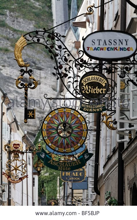 Historic old town lane with wrought-iron shop signs, Getreidegasse alley, Salzburg, Austria, Europe Stock Photo Storefront Signs, Trade Sign, Salzburg Austria, Pub Signs, Sign Of The Times, Shop Sign, Shop Fronts, Old Signs, Store Signs