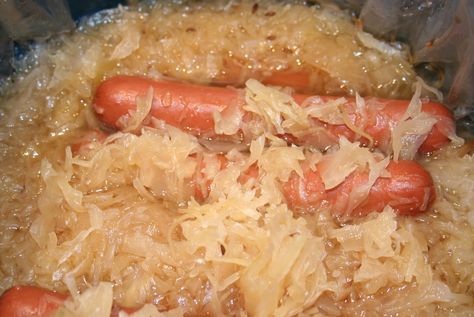 Hot Dogs cooked in Beer & Kraut (I love these.  Use any beef hotdog, canned sauerkraut is best/stronger in flavor and use your favorite beer.  Simmer on stove-top or in a crockpot. Great flavor! -- Deb) Hot Dogs And Sauerkraut, Canned Sauerkraut, Dogs Recipes, Dinner Casserole Recipes, Hot Dog Toppings, Homemade Sauerkraut, Sausage Sandwiches, Slow Cooker Recipes Beef, Sauerkraut Recipes