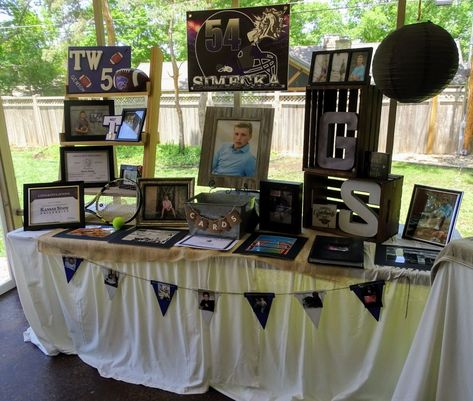 2023 Graduation Table Decorations, Senior Table Display Ideas, Pictures On Tables At Party, Senior Graduation Table Display Pallet, Graduate Table Ideas, Graduation Achievement Table, Graduation Table Ideas Display Boys, Graduation Party Display Table, College Graduation Table Ideas