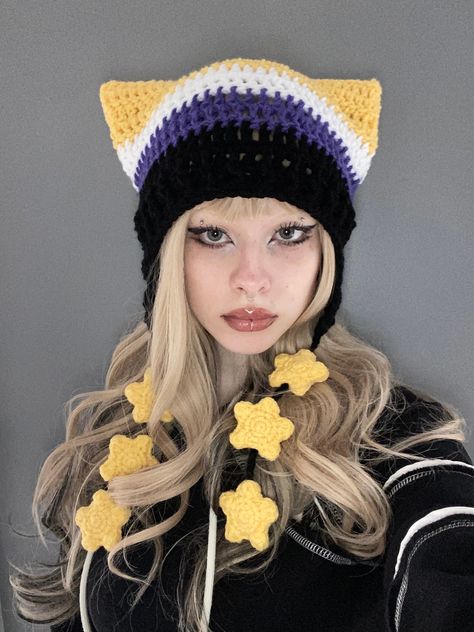 these soft, super cute crochet hats with cat ears, ear flaps, and stars are each inspired by a pride flag! 100% handmade. Made with acrylic yarn.   colors may vary slightly! contact me with any questions about this listing💌 Stars Crochet, Pride Diy, Lgbtq Flag, Crochet Cat Hat, Earflap Beanie, Бисер Twin, Accessories Aesthetic, Flap Hat, Easy Crochet Animals