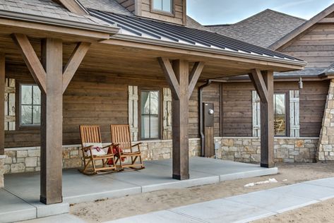 Product Use:  Wire Brushed ranchwood™ in Western color using square edge trim in 1x3, 1x6, 1x8, square edge lap siding in 1x8 and 1x6 tongue and groove soffit and porch overhang material.  10x10x10 posts, 6x6x10 timber frame accents in the gables. Rustic House Exterior, Porch Overhang, Wood Siding Exterior, Ranch House Exterior, Rustic Exterior, Lap Siding, Cabin Exterior, Modern Rustic Homes, Timber Frame Homes