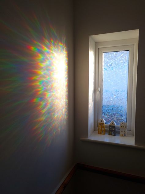 Walking by this window whilst the sun pours through makes me happy #rainbow #happyhome #homedecor #tealights Rainbow Reflection Window, Rainbow Glass Window, Rooms Astethic, Sunshine Through Window, Sun Through Window, Rainbow Room Aesthetic, Shine Aesthetic, Rainbow Window Film, Prism Window