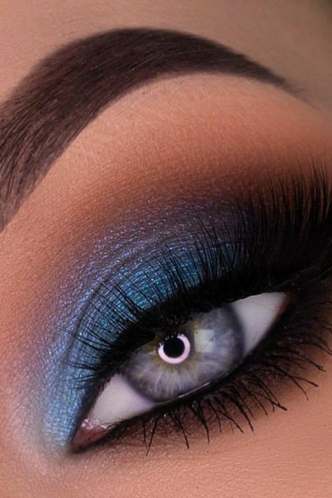 Make Up With Dark Blue Dress, Snowball Makeup Ideas, Peacock Blue Eye Makeup, Dark Blue Sparkly Eye Makeup, Makeup That Goes With Blue Dress, Royal Blue Eyeshadow Looks Prom, Prom Makeup With Blue Dress, Colorful Eye Makeup For Blue Eyes, Blue And Silver Smokey Eye