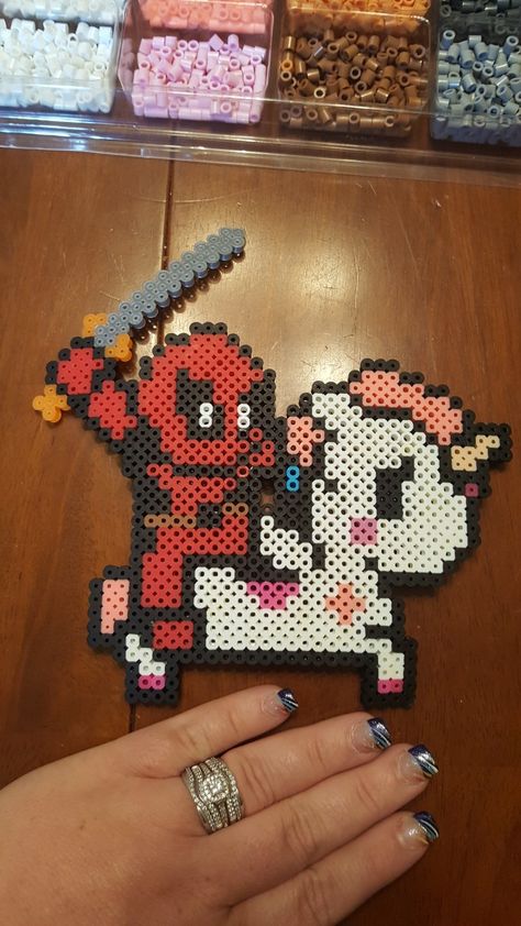 Deadpool on a unicorn perler Free Perler Bead Patterns, Deadpool Perler Beads, Deadmau5 Perler, Skelanimals Perler Bead Pattern, Ghastly Perler Bead Patterns, Deadpool Pearl Beads, Rave Perler Pattern, Daredevil Perler Beads, Melted Bead Crafts