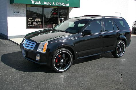 Cadillac SRX with new rims and low profile tires Cadillac Srx Custom, Customised Trucks, Truck Repair, Toledo Ohio, Cadillac Srx, Repair Shop, Toledo, Tires, Cadillac