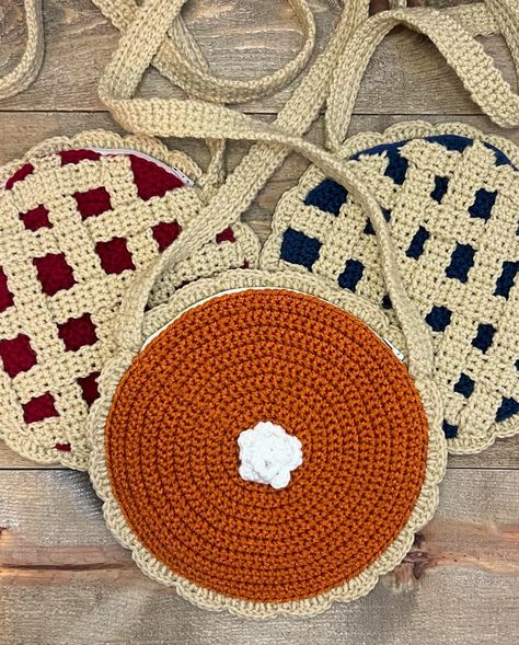 You guys really loved my pumpkin pie purse!! 🥹 So here’s the whole collection! I’m absolutely obsessed with these, and not just because of the time and effort that went into making this dream come true. I just love the pie theme for fall! Freshly Baked Pie Purses 🥧 available in my Etsy shop. Link is in bio!! 😇 #crochet #crochetaddict #crochetersofinstagram #crochetart #crochet_relax #crochetcommunity #crochetaddiction #crochetcrew #crochetproject #crochetpatterns #crochetgram #crochetting ... Crochet Pie Purse, Crochet Blueberry, Blueberry Pumpkin, Christmas Purse, Crochet Christmas Wreath, Crochet Strawberry, Crochet Geek, Pumpkin Pecan, Crochet Food