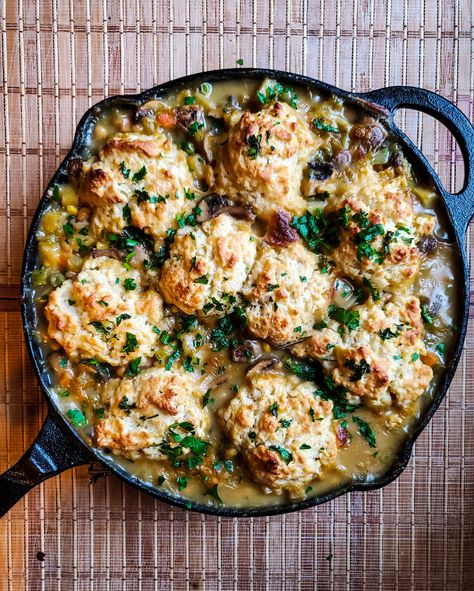 Biscuits and stew in one skillet, you slay me. Hearty veggie stew baked under a layer of drop biscuits that get so golden brown on top and so soft underneath, it's the perfect contrast. Stew With Biscuits On Top, Recipe For Stew, Drop Biscuit Recipe, Veggie Stew, Turkey Stew, Drop Biscuits Recipe, Baking Powder Biscuits, Biscuits Recipes, Mushroom Stew