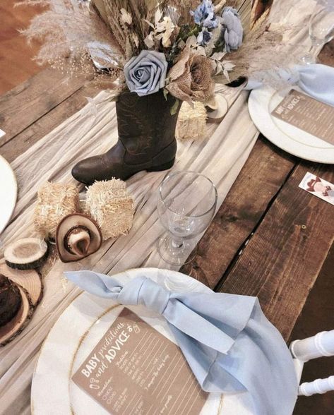 A New Little Cowboy is On His Way! | CatchMyParty.com Baby Shower Snack Table Ideas, Western Boy Baby Shower Ideas Cowboy Theme, Vintage Cowboy Baby Shower Ideas, Not Her First Rodeo Baby Sprinkle, Cowboy Theme Baby Shower Ideas, Western Baby Shower Centerpieces, Cowboy Baby Shower Centerpieces, Western Themed Baby Shower Ideas, Rodeo Baby Shower Ideas