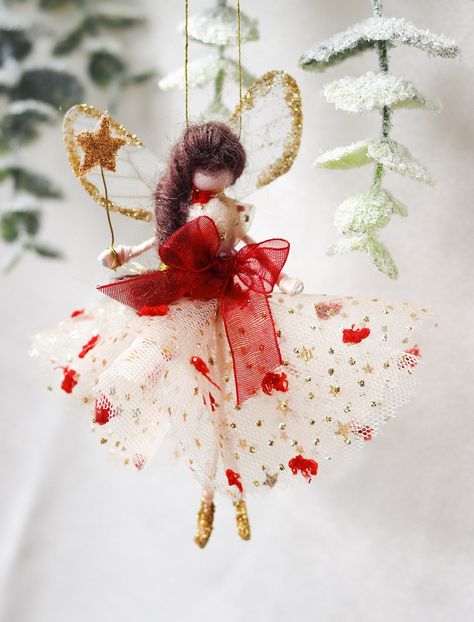 This little fairy is dressed in a glitter tulle gown with a red spotted tulle overlay. She has sashed her gown at the waist with a red Organza ribbon. She has little shoes dipped in glitter and of course, her glittered wand to grant you your wishes! Fairy Christmas Tree Ideas, Fairyland Christmas, Fairy Christmas Ornaments, Xmas Fairy, Fairy Christmas Tree, Christmas Fairies, Christmas Tree Fairy, Fairy Christmas, Art Fairs