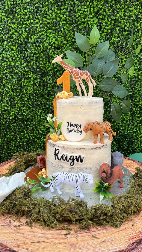 cake idea for a safari themed party #birthdayparty #safari #safaribirthdayparty #safaribaby #safaribirthday #wildlife #wildonebirthdayparty #babyboy #babyshowerideas #birthdaypartyideas #birthdaydecor #birthdaycakeideas #cakedesign #cakedecoratingideas #cakeideas #animals Safari Themed Birthday Cake, Cake Wild One, Safari Themed Party, Wild One Party, African Savanna, Safari Theme Party, Wild One Birthday Party, Safari Birthday Party, Themed Birthday Cakes