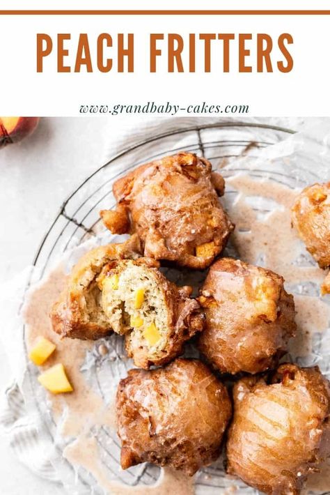 The Most Irresistible Peach Fritters are here! A perfect pastry dough is filled with ripe spiced peaches. Then they get deep fried until golden brown perfection then topped with a sweet glaze. #donuts #doughnuts #peach #peaches Peach Fritters, Spiced Peaches, Sweet Glaze, Fritters Recipe, Fruit Dessert Recipes, Fritter Recipes, Peach Recipe, Pastry Dough, Breakfast Breads