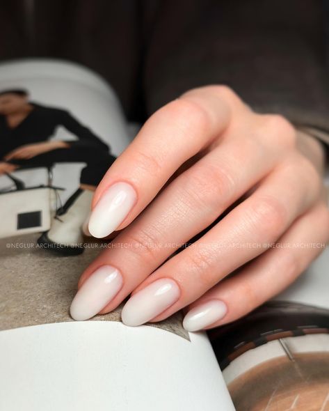 Wedding manicure 💍 milky white almond nails @tienda.ro nail products: ▫️Milky White Gel ▫️Ultra Finish Top Gelaxyo —Neglur Architech, Certified Nail Technician, Reykjavik #neglur #gelneglur #neglurinsta #weddingnails #reykjavik Short Oval Milky White Nails, Milky White Wedding Nails, Milky Almond Nails, Milky Manicure, Milky White Almond Nails, Milky White Nails, White Almond Nails, Wedding Manicure, White Manicure