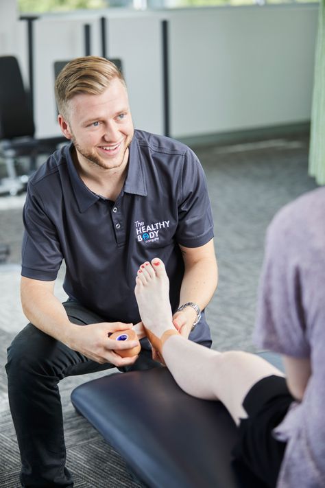 🏋️‍♀️ Ankle strapping: the secret to stability and injury prevention! 💪 Physiotherapists swear by this technique to provide external support, enhance rehab, and boost confidence. Benefits include enhanced stability, injury prevention, and customized support. Say goodbye to ankle rolls and hello to better performance! Consult a physiotherapist for expert guidance. #AnkleStrapping #InjuryPrevention #StabilityMatters #physiotherapy #physio How To Strap An Ankle Injury, Physical Therapy Photography, Physical Therapy Headshots, Physical Therapist Photoshoot, Physiotherapist Photoshoot, Physiotherapy Photoshoot, Physical Therapy Branding Photos, Physio Photography, Physical Therapy Photoshoot