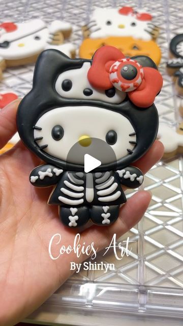 Shirlyn Leong on Instagram: "Hello Kitty in skeletons costume. Let me know if you are kitty fans. 
#hellokitty #decoratedcookies #cookieart #cookiesart #decoratedsugarcookies #edibleart #sugarcookies #cookieartist #sugarcookies #carolinacookier #dimensionalcookies #halloweencookies #hellokittycookies #halloweenhellokitty #halloweenhellokittycookies" Hello Kitty Spray, Hello Kitty Cookies, Skeleton Costume, Cookie Art, Halloween Cookies, Edible Art, Sugar Cookies Decorated, Spray Paint, Cookie Decorating