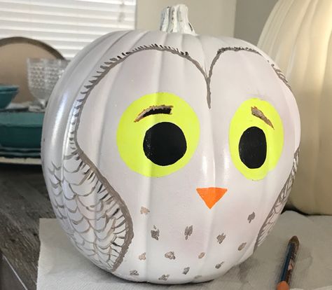 Hedwig pumpkin with glow in dark eyes and a couple places for light to come through as well Hedwig Pumpkin Painting, Painted Owl Pumpkin, Owl Painted Pumpkin, Harry Potter Painted Pumpkin, Owl Pumpkin Painting, Hedwig Pumpkin, Harry Potter Pumpkin Painting, Literary Pumpkins, Owl Pumpkin Carving