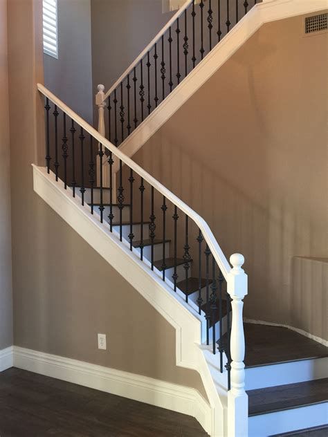 Best 5 Black Handrails For Stairs #stairs #stairsdesign #design #ideas White Banister With Black Spindles, Black Handrails For Stairs, Curved Staircase Foyer, Black Spindles, White Banister, Black Hardwood Floors, Handrails For Stairs, White Railing, White Stair Risers