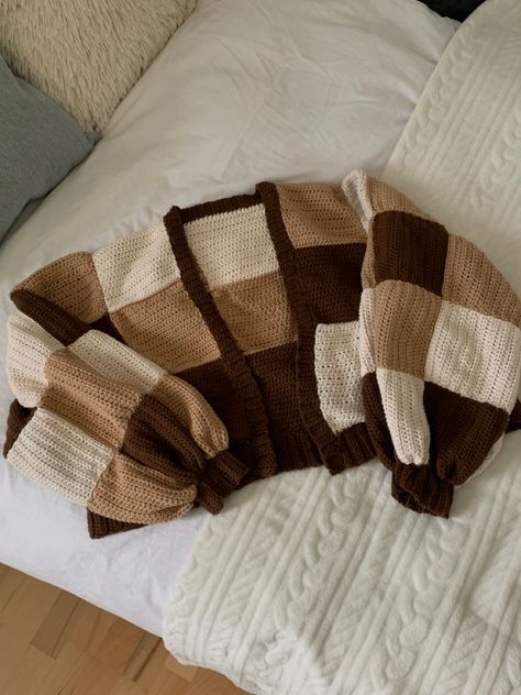 Harry Styles inspired patchwork cardigan with brown beige white wool aesthetic crochet Crochet Cardigan Design Pattern, Crochet Sweater Colors, Crochet Block Cardigan, Fall Patchwork Cardigan, Crochet Brown Yarn, Crochet Brown Top, Patchwork Crochet Sweater Layout, Patch Crochet Cardigan, Fall Crochet Cardigan