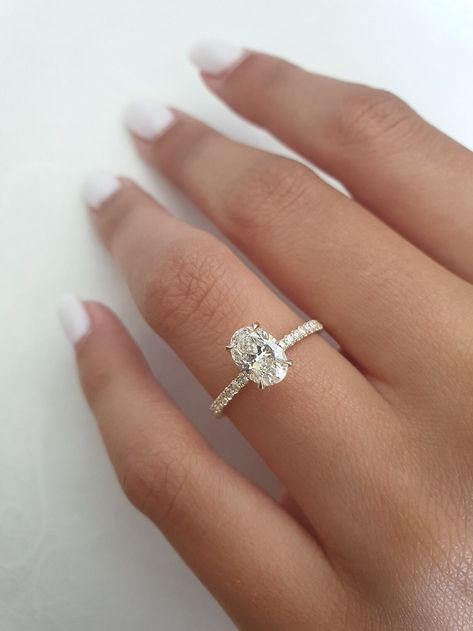 Amazing Oval Cut Ring 1.25 CT Hidden Halo Ring, Moissanite Solitaire Ring, Birthday Gifts For She, Promise Ring, Wedding Ring, Bridal Ring 𝐓𝐡𝐞 𝐬𝐭𝐨𝐧𝐞𝐬 𝐢𝐧 𝐣𝐞𝐰𝐞𝐥𝐫𝐲 𝐚𝐫𝐞 𝟏𝟎𝟎% 𝐡𝐚𝐧𝐝-𝐜𝐫𝐚𝐟𝐭𝐞𝐝 𝐢𝐭 𝐢𝐬 𝐜𝐮𝐭 𝐚𝐧𝐝 𝐩𝐨𝐥𝐢𝐬𝐡𝐞𝐝 𝐛𝐲 𝐨𝐮𝐫 𝐞𝐱𝐩𝐞𝐫𝐢𝐞𝐧𝐜𝐞𝐝 𝐜𝐫𝐚𝐟𝐭𝐬𝐦𝐚𝐧. 𝐌𝐨𝐢𝐬𝐬𝐚𝐧𝐢𝐭𝐞 𝐢𝐬 𝐚 𝐝𝐢𝐚𝐦𝐨𝐧𝐝'𝐬 𝐛𝐞𝐬𝐭 𝐚𝐥𝐭𝐞𝐫𝐧𝐚𝐭𝐢𝐯𝐞. ✥ 𝐌𝐚𝐢𝐧 𝐒𝐭𝐨𝐧𝐞 𝐃𝐞𝐭𝐚𝐢𝐥𝐬 ↣ Shape: Oval Cut ↣ Type: Moissanite Diamond ↣ Weight: 1.25 CT (App.) 1.2 Carat Oval Diamond, 1 Carat Oval Diamond Ring, Oval Diamond Gold Band Engagement Ring, Oval Engagement Ring 1 Carat, 1 Carat Oval Engagement Ring, Hidden Halo Ring, Pretty Engagement Rings, Ring Inspo, Moissanite Solitaire Ring