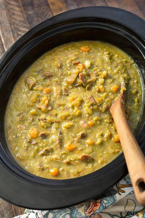 Slow Cooker Split Pea Soup with ham, or without, is a delicious comfort food soup! Make this crock pot split pea soup recipe on a chilly day or anytime! Pea Soup Crockpot, Split Pea Soup Slow Cooker, Slow Cooker Split Pea Soup, Split Pea Soup Crockpot, Simply Happy Foodie, Yellow Split Pea Soup, Ham Bone Soup, Split Pea Soup Recipe, Pea And Ham Soup