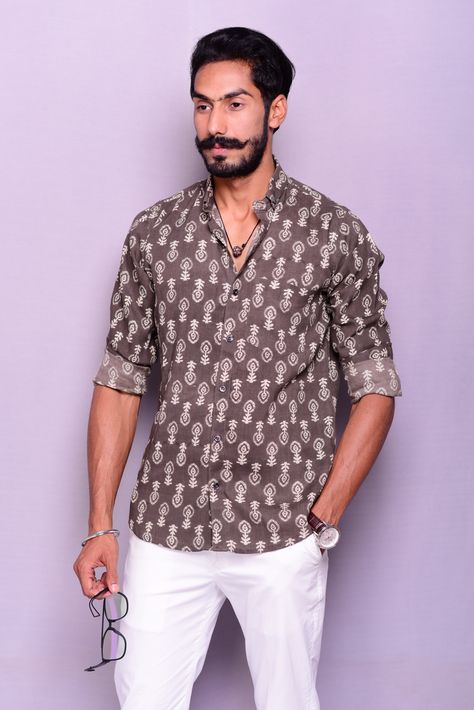 The Sanganeri word originated from Sanganer, a small village in Rajasthan where it all started. The Sanganeri fabric is in vogue in home décor furnishings and fashion apparels. Hand-block printing is an inseparable part of cultural heritage of Rajasthan. Sanganeri Print Shirt Men, Prints Inspiration, Sanganeri Print, Mens Indian Wear, Printed Shirts Men, Small Village, Print Inspiration, Men Style Tips, Block Printing