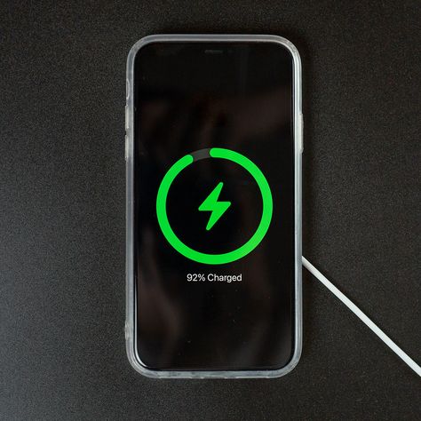 Find out the charging mistake that is ruining your phone's battery on SHEFinds.com. 2023 Ideas, Apple Charger, Apple Support, Iphone Battery, Phone Plug, Portable Power Bank, Phone Battery, Phone Charging, Portable Power