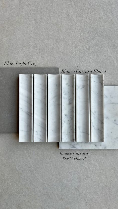 Tiles: Flow Light Grey, Bianco Carrara Fluted, Bianco Carrara 12x24 Honed  Flatlay | Home Remodel | Commercial Design | Tile Inspiration | Bathroom | Kitchen | Living Room | Restaurants | Interior Design Marble Fluting, Fluted Bathroom, Fluted Marble, Fluted Tile, Living Room Restaurant, Toilet Wall, Tile Inspiration, Stone Pattern, Marble Tile