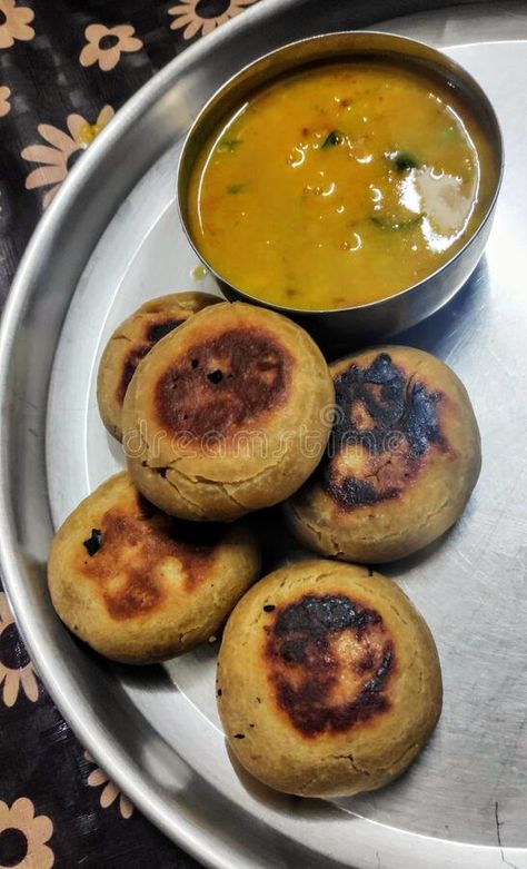 Dal baati dish Photo about cuisine, dish, churma, dairy, fruit, baati, dessert, snack, breakfast, produce, plant, bread, baking, indian, food, vegetable, meal, meat - 178806948 Dal Baati Churma, Vegetable Meal, Indian Food, Bread Baking, Indian Food Recipes, Dairy, Bread, Dessert, Snacks