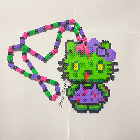 Custom Hello Kitty Necklace Zombie Version I Have Others Listed Too. Pendent Is About 6in Tall And 4in Wide. Necklace Part Can Be 14-15in Long. Emo Gumball, Kandi Hello Kitty, Fused Beads Patterns, Scene Perler Beads, Cute Perler Bead Ideas, Rave Crafts, Small Perler Bead Patterns, Zombie Hello Kitty, Kawaii Kandi