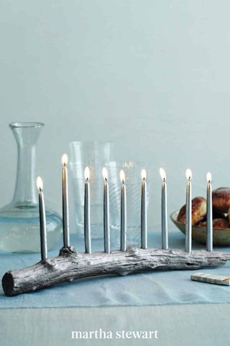 Follow our simple tutorial for this DIY menorah you will need a few supplies and a branch at least 16 inches long, with a raised knot for the shamash. #marthastewart #hanukkah #giftideas #hanukkahideas #family #holidaycelebration Diy Menorah, Diy Hanukkah, Arte Judaica, Hanukkah Crafts, Chanukah Decor, Hanukkah Candles, Hanukkah Decorations, Hanukkah Menorah, Jewish Holiday