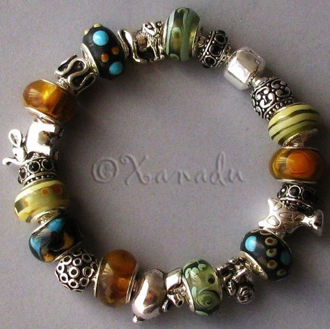 Going On Safari Charm Bracelet  Black Brown by xanaducharms, $39.95 Gemstone Bracelets Ideas, Pandora Bracelet Designs, Trendy Fall Fashion, Bracelets Ideas, On Safari, Pandora Beads, Jewelry Lookbook, Tiger's Eye, Jewelry Inspo