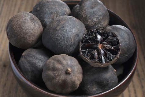 What is Black Dried Lime and How to Use It - Fine Dining Lovers Dried Lime, Fruit Garnish, Lime Powder, Lime Recipes, Persian Cuisine, Dried Lemon, Lime Rice, Black Food, Eastern Cuisine