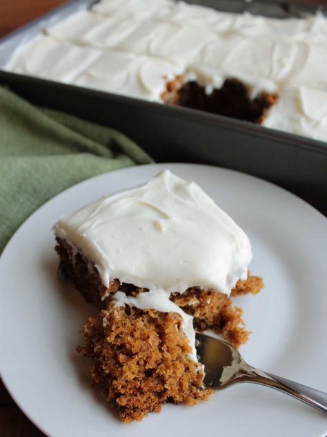 Grandma's applesauce cake is an heirloom recipe that has been passed through the generations. The cake has a really moist crumb and plenty of spice. You can make it with or without the raisins and walnuts depending on your preferences. This is certain to become a favorite fall dessert in your family as well. Gf Applesauce Cake, Applesauce Cake With Raisins, Applesauce Layer Cake, Applesauce Raisin Cake Recipe, Honey Applesauce Cake, Apple Sauce Cake Recipe Easy, Things To Make With Applesauce, Applesauce Cake Old Fashioned, Applesauce Cake Easy