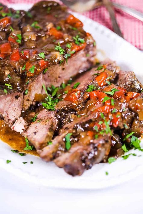 This easy Slow Cooker Italian Beef is the ultimate comfort food. This tender Crock Pot beef roast is cooked in Italian seasonings and rich gravy. #slowcooker #crockpot #easyrecipe Crock Pot Beef Roast, Italian Beef Recipe, Italian Roast Beef, Italian Beef Recipes, Italian Pot Roast, Slow Cooker Italian, Slow Cooker Italian Beef, Italian Seasonings, Crock Pot Beef