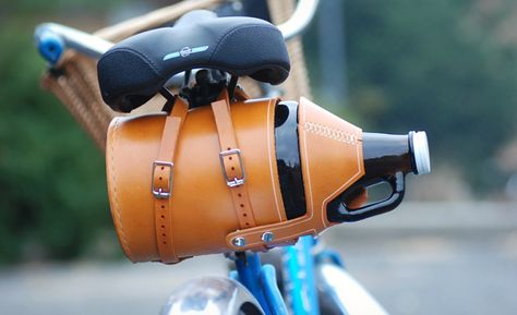 Booze & Cruise! Meriwether Montana Made A Leather Growler Carrier For Your Bike | Cool Material Growler Carrier, Biking Accessories, Beer Growler, Nerdy Gifts, Tea Lovers Gift, Bike Seat, Jeep Gladiator, Baby Carrier, Black Vinyl