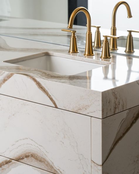 Our Castle Spa bathroom design showcases a stunning custom vanity, featuring the elegant Cambria Quartz, Brittanicca Gold. The sleek, hardware-free drawers offer a seamless look, keeping the focus on the rich veining and luxe feel of the quartz. ⁣ Topped with a sleek gold faucet, this space combines modern sophistication with timeless luxury. A true showstopper!⁣ ⁣ ⁣ ⁣ #AspenandIvyInteriors | Project Castle Spa | Photo @natkay.ca Spa Bathroom Design, Gold Faucet, Cambria Quartz, Spa Bathroom, Custom Vanity, Timeless Luxury, Bathroom Spa, Showcase Design, Aspen