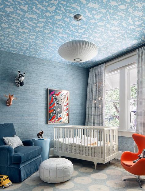 White and blue boys nursery designed with a white mid-century modern crib in the corner. Boy Nursery Design, Blue Nursery Boy, Contemporary Nursery, Miami Apartment, Nursery Interior Design, Home Interior Ideas, Modern Crib, Moroccan Leather Pouf, Nursery Room Inspiration