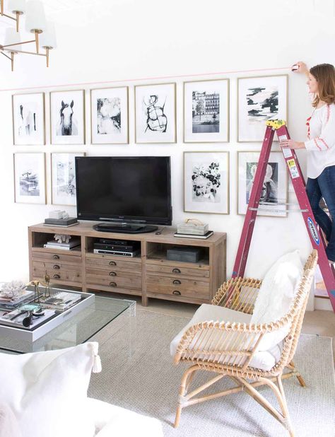 using laser level to hang art above TV Beach House Tv Wall, Tv Area Design, Grid Gallery Wall, Tv Area, Christmas House Tour, New Kitchen Gadgets, Driven By Decor, Gallery Wall Layout, Best White Paint