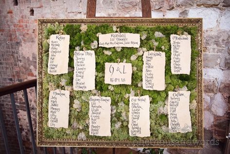 Custom table plan with Lord of the ring text and real moss at Lulworth castle wedding #lordoftherings #lulworthwedding #weddingdetails #weddingday Lord Of The Rings Wedding Welcome Sign, Middle Earth Wedding Decor, Lord Of The Rings Wedding Table Names, Lord Of The Rings Table Decorations, Lord Of The Rings Wedding Theme, Lotr Wedding Ideas, Medieval Wedding Decorations, Tolkien Wedding, Lulworth Castle