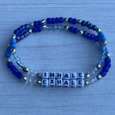 ⭐️Featured Bracelet of the Day 7/12⭐️ Breathe in peace and exhale happiness with our INHALE & EXHALE bracelet pair Set #2! These beautiful bracelets, featuring calming blue and clear beads, are perfect for centering your mind and body. Carry a reminder to focus on your breath and stay present. 💙 #EtsyShop #MamasCraftyCornerLC #HandmadeWithLove #CustomCrafts #Mindfulness #Breathwork #Inhale #Exhale #SelfCare #MentalHealthBracelets #SupportSmallBusiness Stay Present, Health Bracelet, Beautiful Bracelets, Inhale Exhale, Clear Beads, Day 7, Focus On Yourself, In Peace, Be Perfect