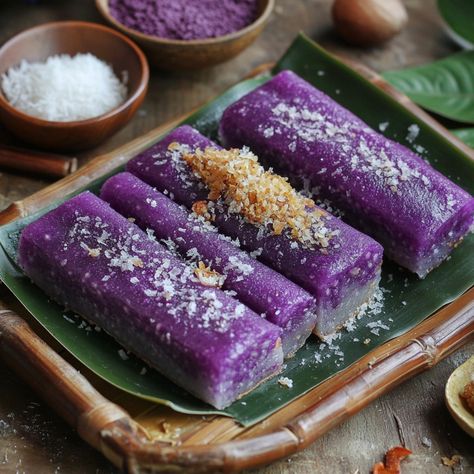 💜🍰 Enjoy Puto Bumbong—a traditional Filipino purple rice cake steamed to perfection. Perfect for a sweet treat! 🌟🍽️ #PutoBumbong #RiceCake Puto Bumbong (Purple Rice Cake) Ingredients: Glutinous rice (1 cup, soaked overnight) Purple yam powder (1/4 cup) Coconut milk (1 cup) Sugar (1/2 cup) Grated coconut (for topping) Brown sugar (for topping) Instructions: Blend soaked rice with purple yam powder and coconut milk. Pour mixture into bamboo molds and steam for 30-40 minutes. Remove from mol... Soaked Rice, Purple Rice, Purple Yam, Instagram Recipes, Filipino Food, Glutinous Rice, Trending Recipes, Grated Coconut, Filipino Recipes