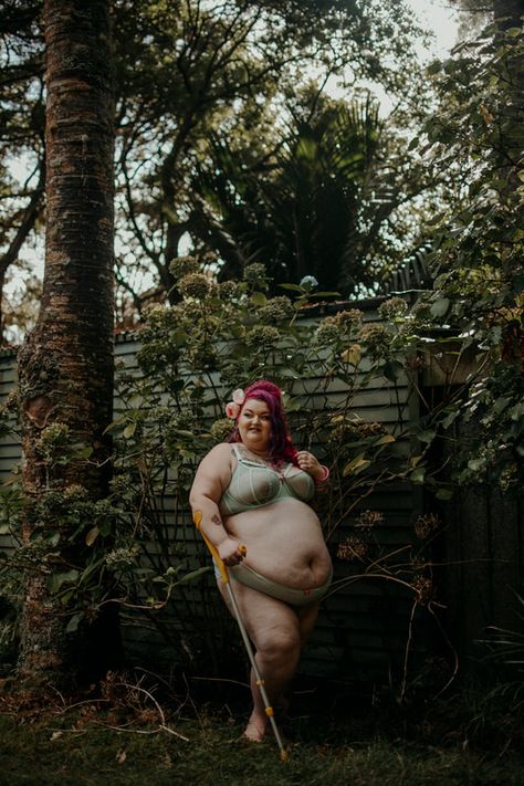 Plus size, disabled woman modelling for a boudoir shoot in lingerie with a green back ground. Body Positivity Photography, Body Positive Photography, Plus Size Posing, Embrace Natural Beauty, People Fly, Outdoor Portraits, Auckland New Zealand, Outdoor Photos, Body Positive