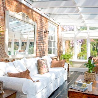 Conservatory with brick wall and ornate mirror | Easy conservatory transformations | Conservatory | PHOTO GALLERY | Housetohome.co.uk Small Conservatory Furniture, Conservatory Interiors Ideas, Brick Sunroom, Conservatory Ideas Interior Decor, Conservatory Ideas Interior, Small Conservatory Ideas, Conservatory Interiors, Small Conservatory, Lean To Conservatory