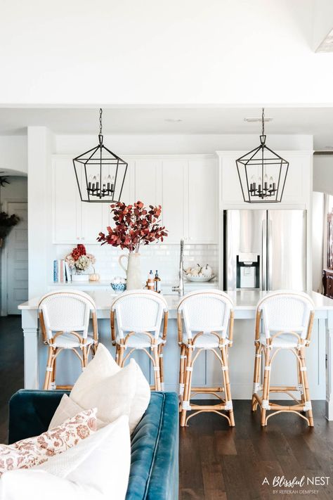 Beautiful fall decor details in this kitchen with burgundy eucalyptus leaves, delicious fall candles, Serena and Lily barstools. #ABlissfulNest #fallkitchen #falldecor #fallideas Fall Kitchen Decor Ideas, Natural Fall Decor, Outdoor Interior Design, Fall Home Decor Ideas, Modern Fall Decor, Wood Trivets, Fall Kitchen Decor, Coastal Interiors Design, Fall Decor Inspiration