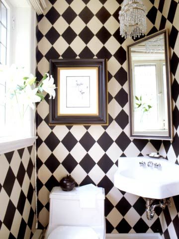 Harlequin wallpaper has a stunning effect in this small-space bathroom. Keeping the colors to simple black and white gives it dignity, not disorganization. Dramatic Powder Room, Harlequin Wallpaper, White Bathroom Tiles, Small Space Bathroom, Powder Room Small, Casa Vintage, Art Deco Wallpaper, Black And White Wallpaper, Bathroom Wallpaper